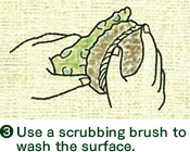 3. Use a scrubbing brush to wash the surface.